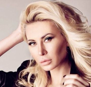 Элина Камирен